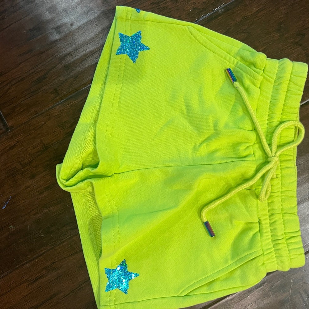 Queen of sparkles Neon Green Shorts with Blue Star Accents